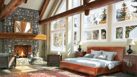 A beautiful modern vacation cabin with wood accents and two matching lamps and lampshades beside the bed