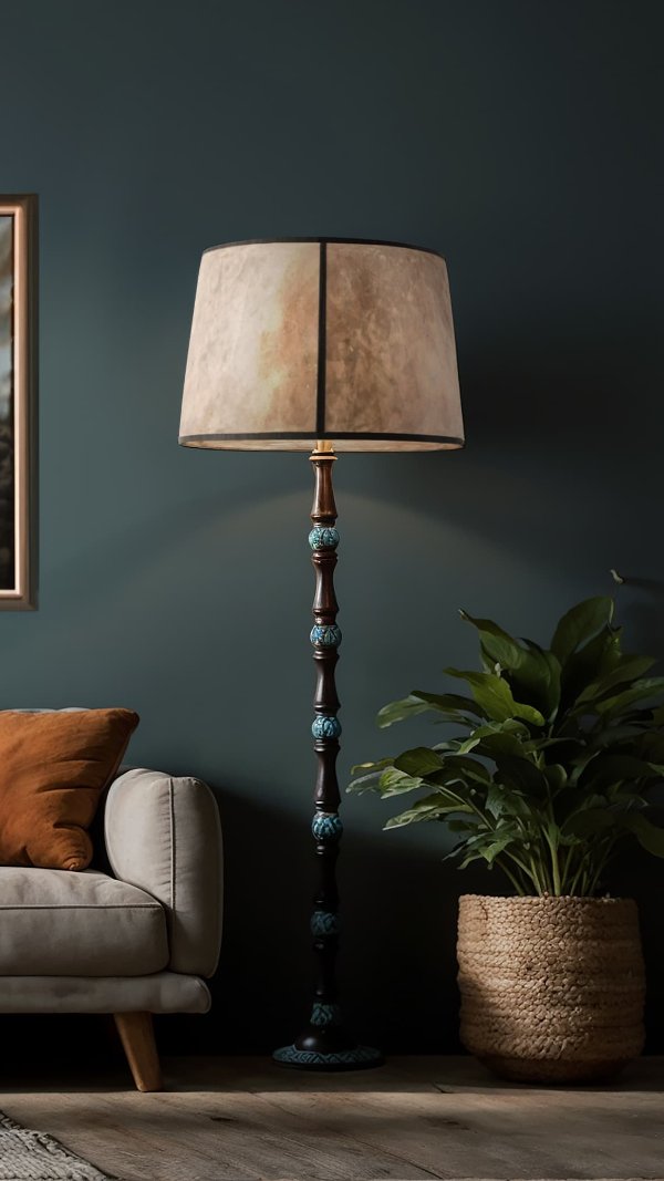 Standing lamp with Mica Retro Drum next to a sofa