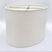 A tapered bone linen oval lampshade with rolled edges and nickel silver spider hardware, shown against a plain white background.