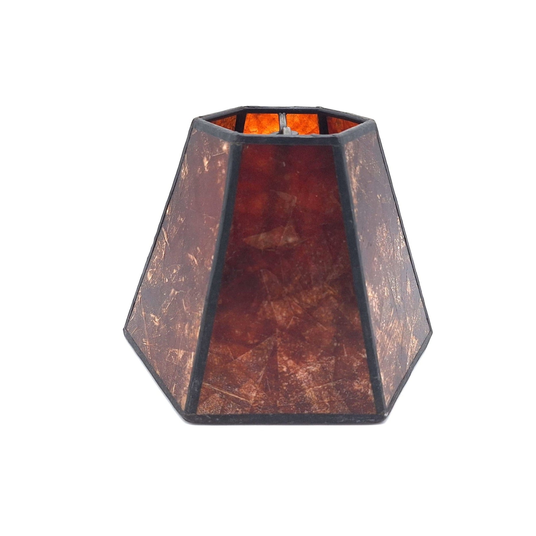 An amber mica chandelier hexagonal lampshade with warm translucent natural stone panels and black metal framing, shown against a plain white background.