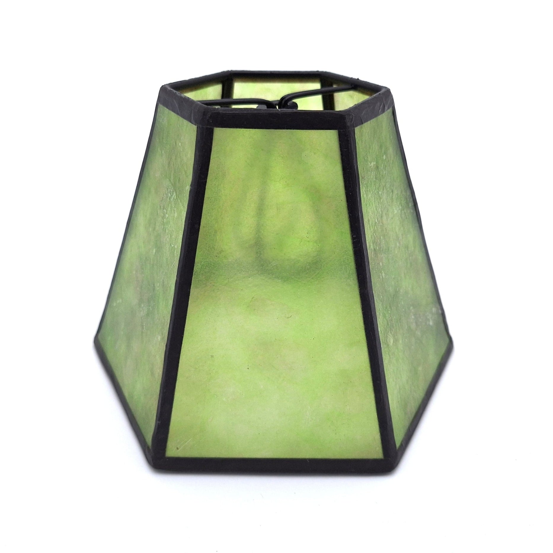 A green mica chandelier hexagonal lampshade with translucent natural stone panels and black metal framing, shown against a plain white background.