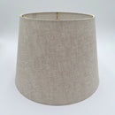 A natural linen British Empire lampshade with rolled edges and translucent finish, shown against a plain white background.
