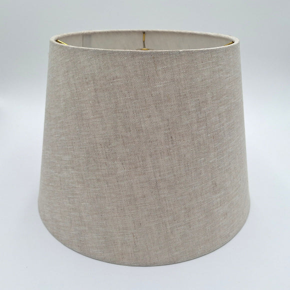 A natural linen British Empire lampshade with rolled edges and translucent finish, shown against a plain white background.