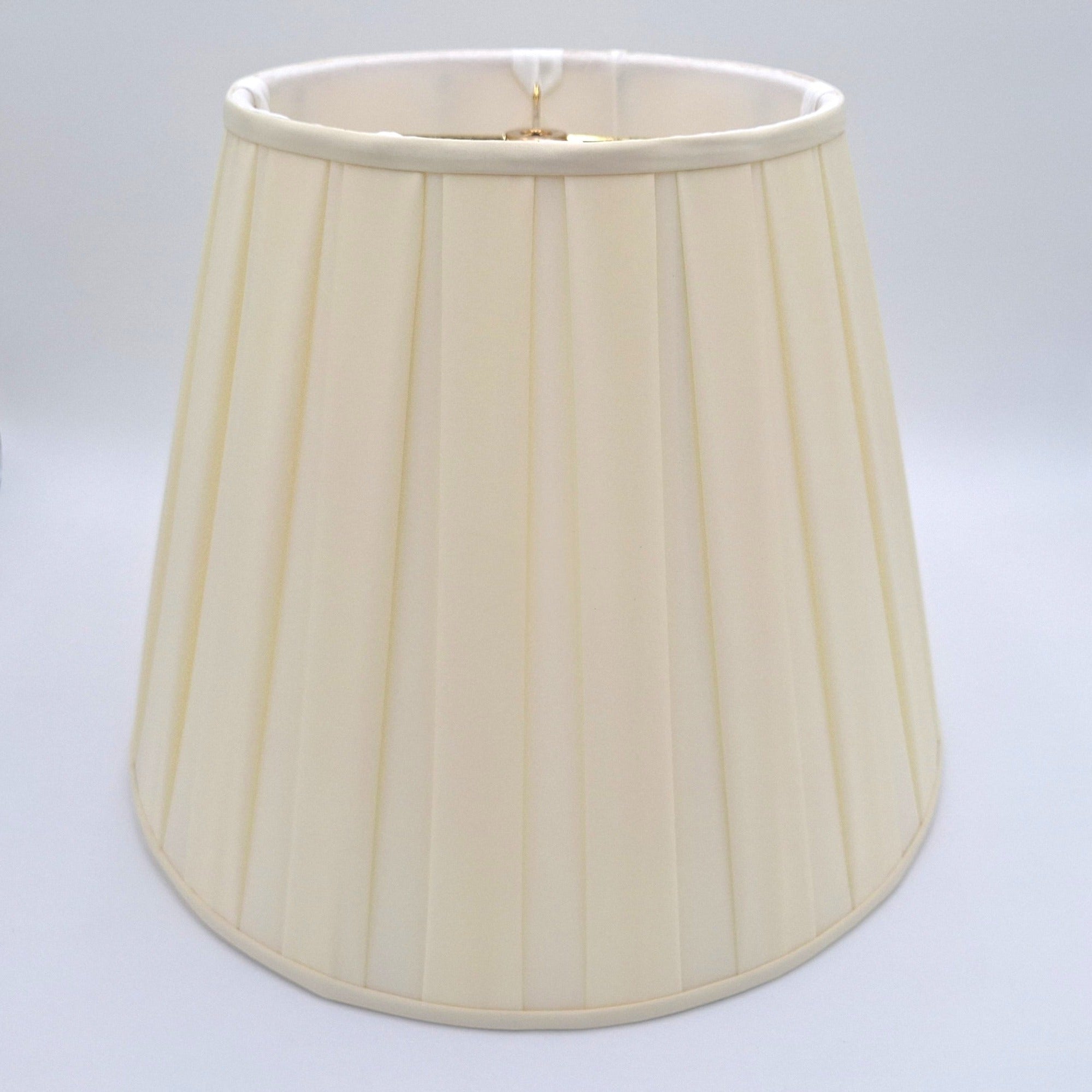 A beige pongee space box pleat empire lampshade with hand-pleated silk fabric and translucent finish, shown against a plain white background.