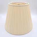An eggshell shantung space box pleat empire lampshade with hand-pleated fabric and translucent finish, shown against a plain white background.