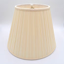An eggshell shantung space box pleat empire lampshade shown at a slight angle, highlighting the distinctive spaced pleat pattern.