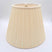 An eggshell shantung space box pleat empire lampshade shown at a slight angle, highlighting the distinctive spaced pleat pattern.